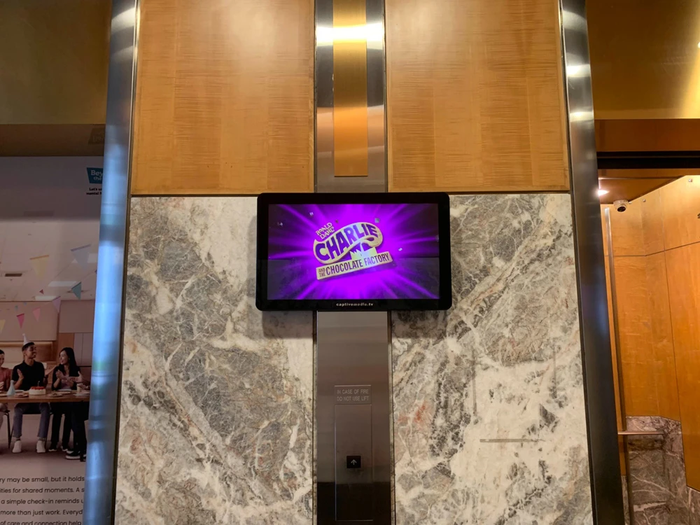 Large-format digital billboard at Design Orchard, Singapore, advertising the GRAVITY concert