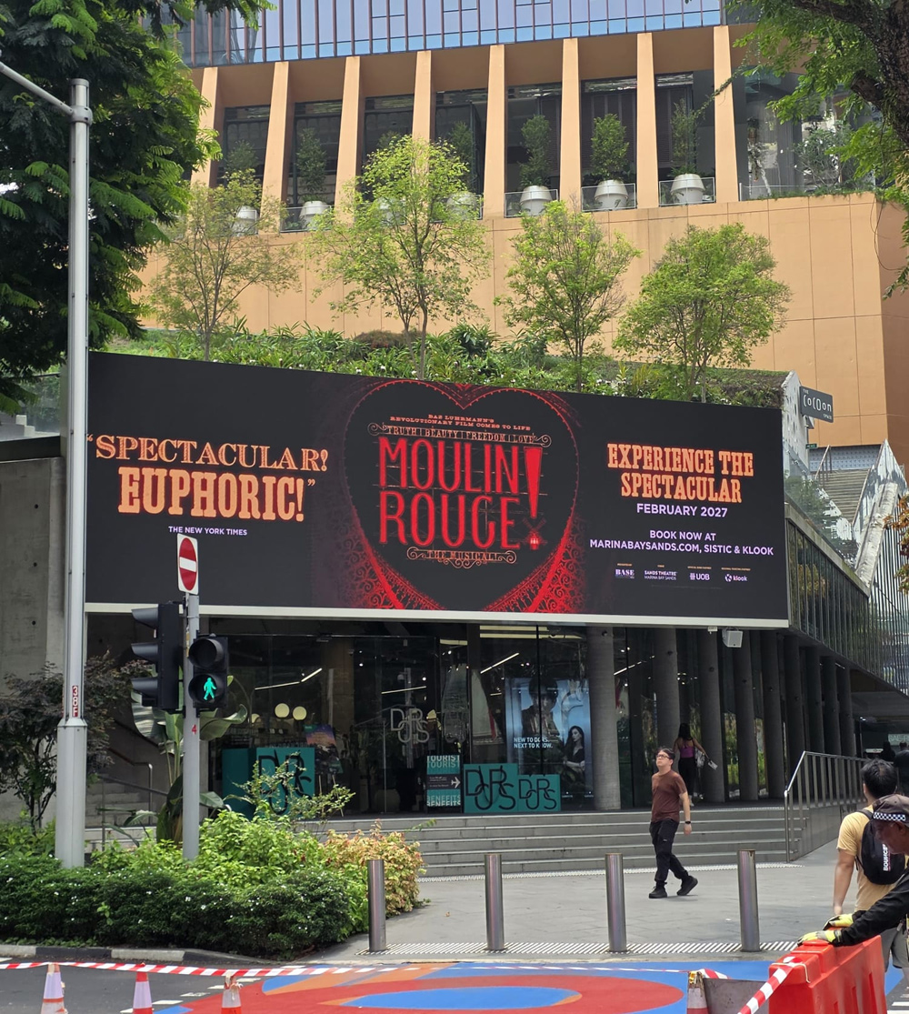 Digital billboard advertising above the entrance of Design Orchard, Singapore